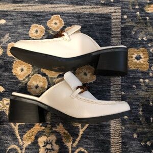 Elegant White Loafers with Chain Detail